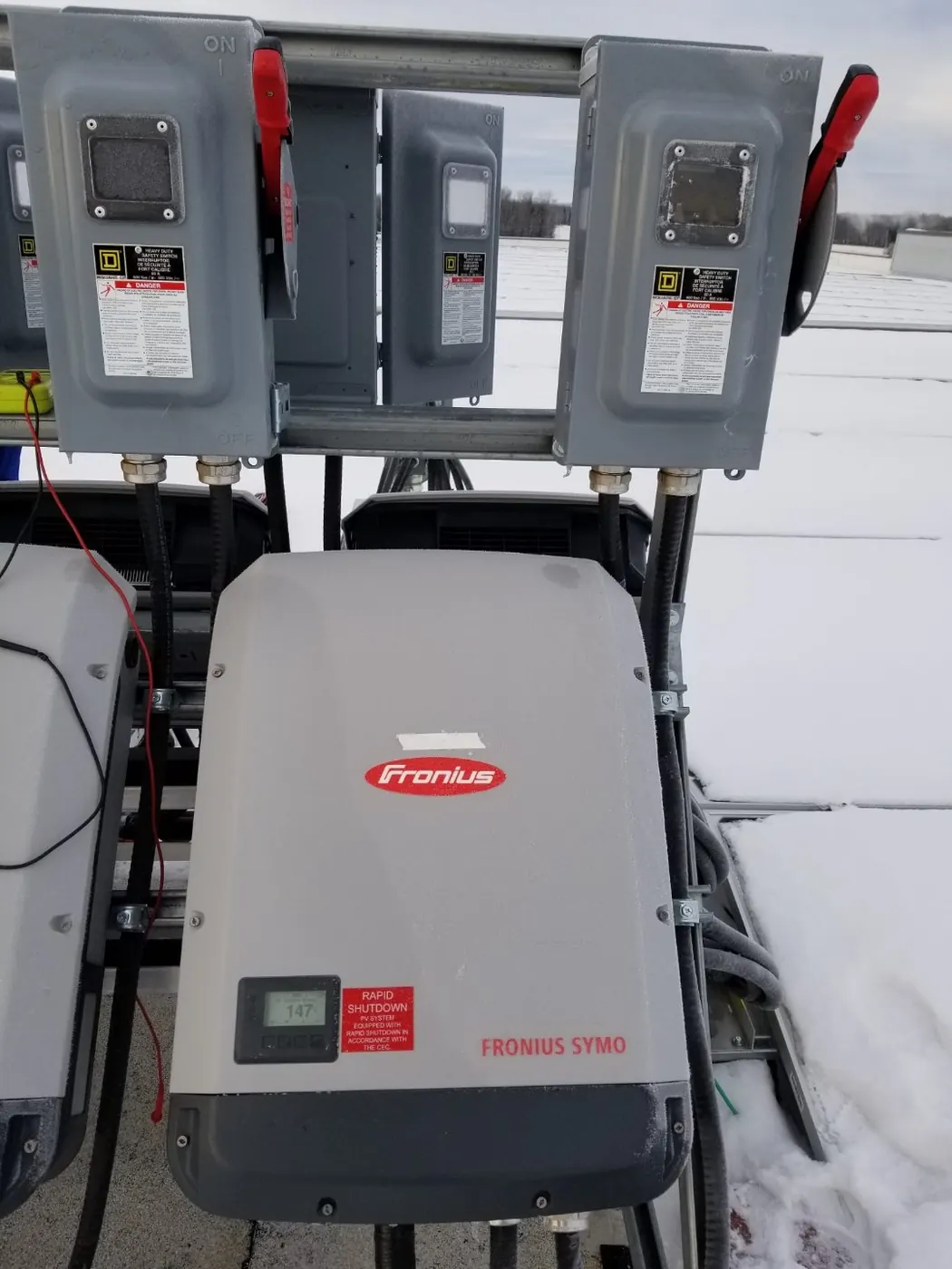 Fronius Symo solar inverter with disconnects installed Alberta