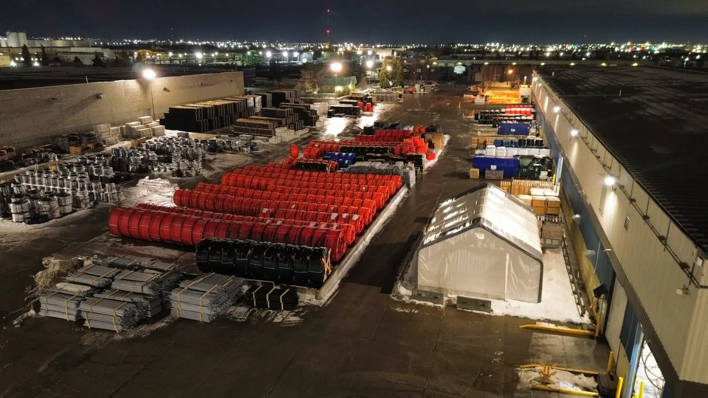Outdoor LED area lighting over an industrial yard in Edmonton