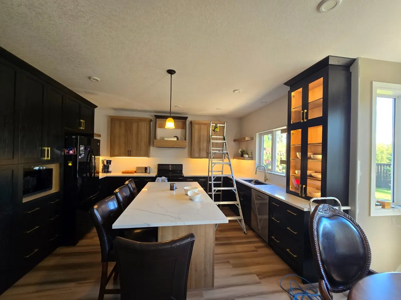 Warm white LED under cabinet lighting in a kitchen remodel in Edmonton
