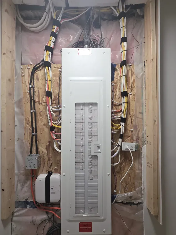 The new Leviton smart panel in the same spot