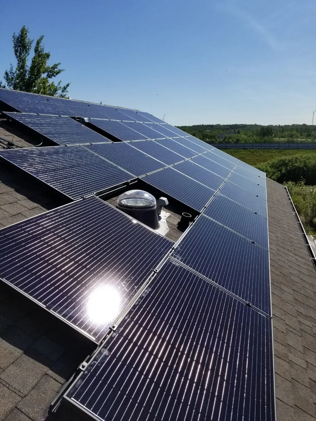 Solar array installation on Edmonton home in summer
