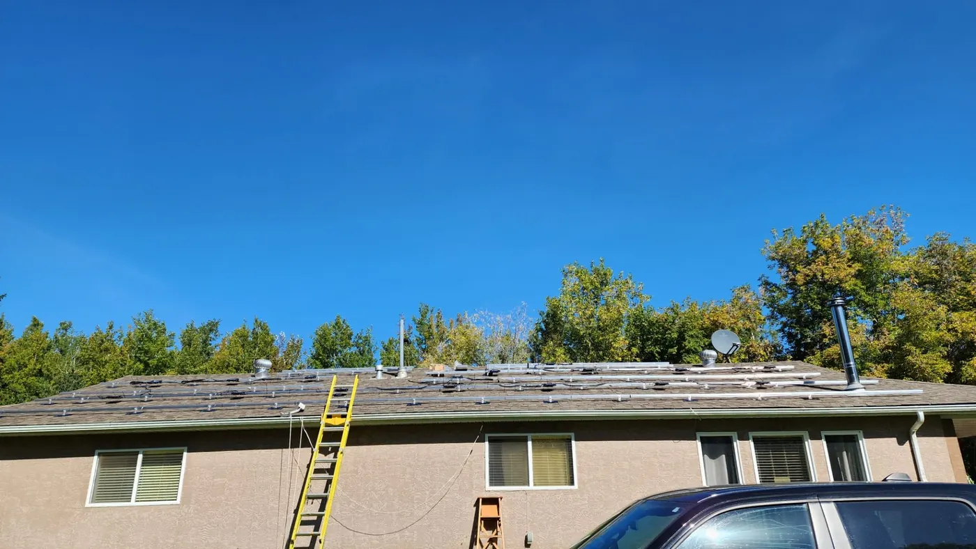 Same Edmonton bungalow with rails only, before panels