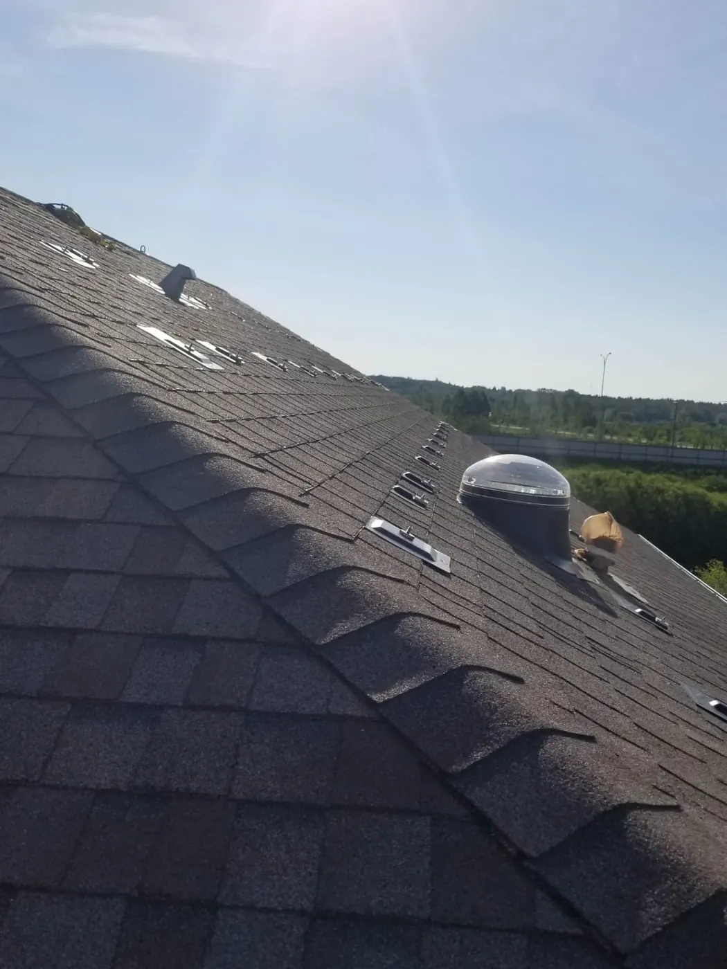 Roof with mounting rails before solar panels, Edmonton